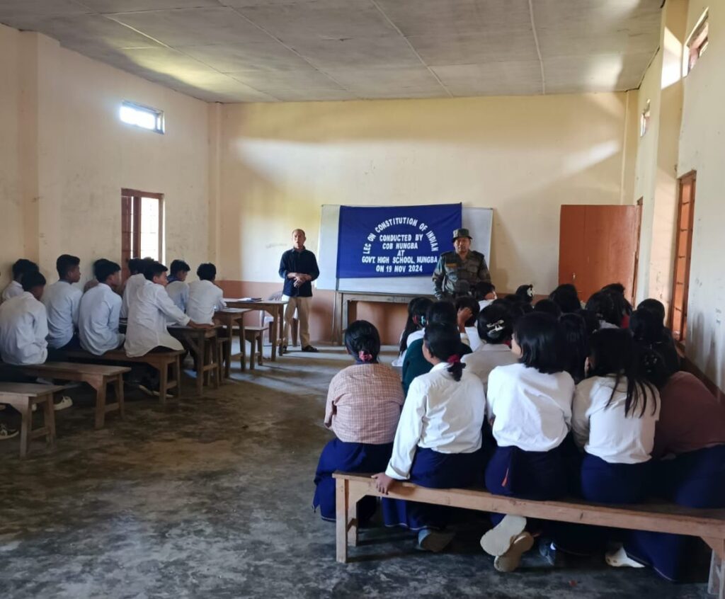 Assam Rifles personnel interacting with students during a Q&A session on the Indian Constitution at Nungba Higher Secondary School, Manipur.