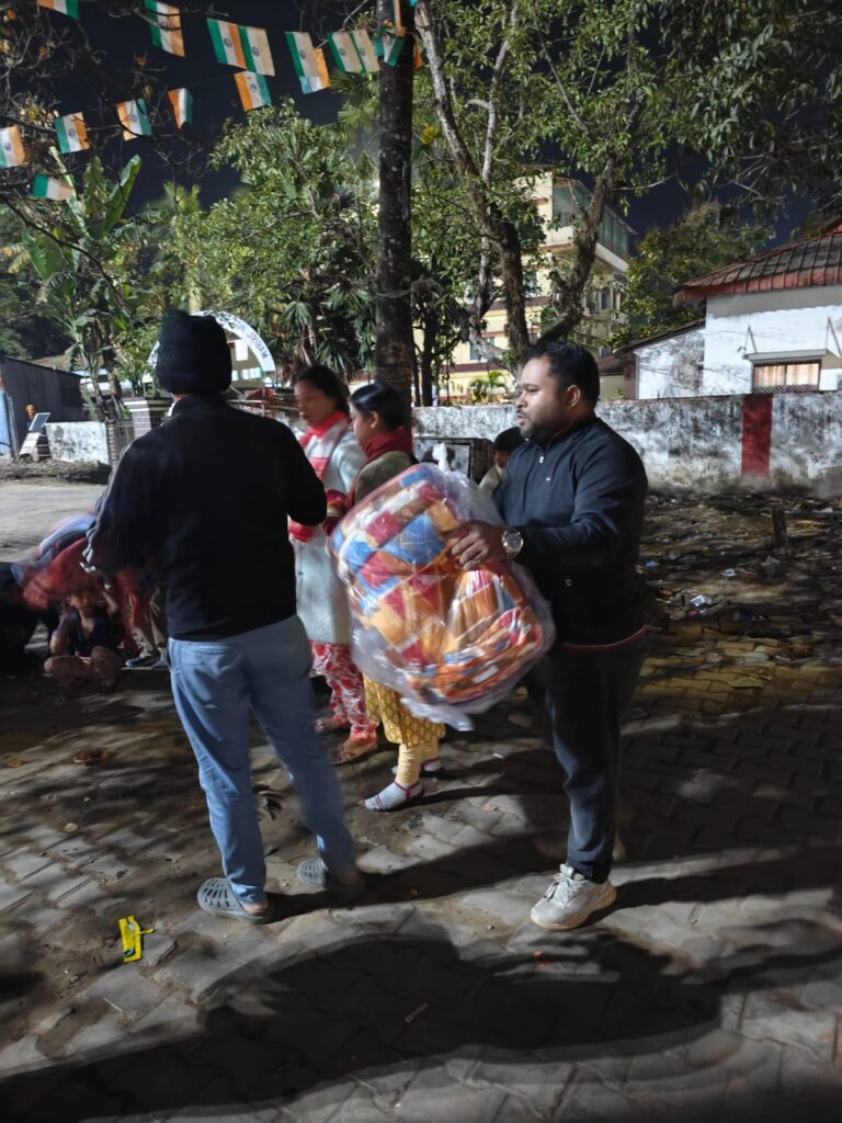 Thunderbolts members distributing blankets to underprivileged individuals in Rangirkhari, Silchar.