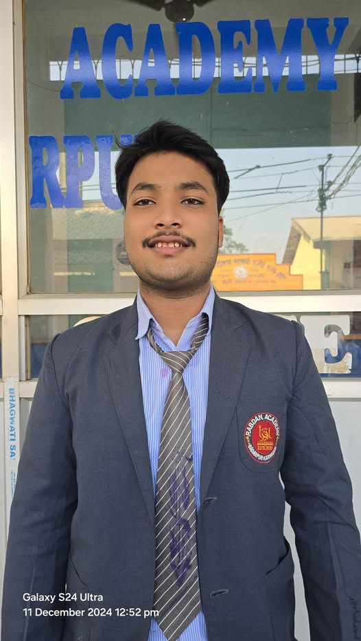 A young boy in a school uniform, representing Dilshad Mohammad Imran, who tragically lost his life in a road accident.