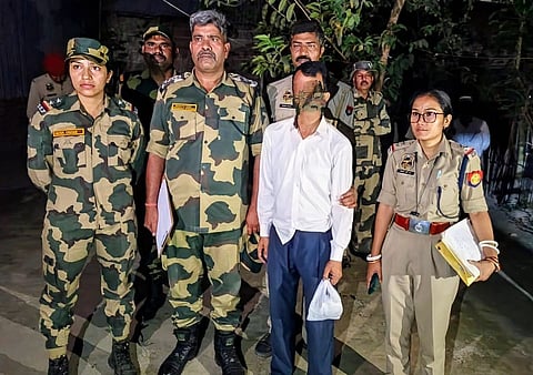 A smuggler was apprehended in Dhubri with counterfeit Indian currency. A smuggler was apprehended in Dhubri with counterfeit Indian currency.