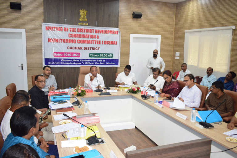 Officials and public representatives at the DISHA meeting reviewing development schemes in Cachar District on July 10, 2025.