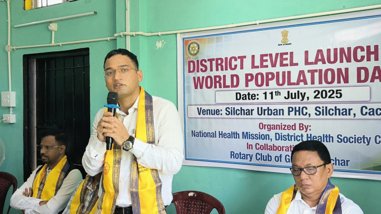 Officials and participants at World Population Day 2025 event in Silchar highlighting youth empowerment and family planning awareness under NHM.